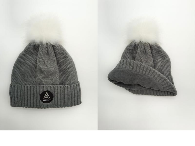 Grey cable knit winter beanie with white faux fur pom pom, shown front and interior fleece lining views - small batch 100pcs accepted