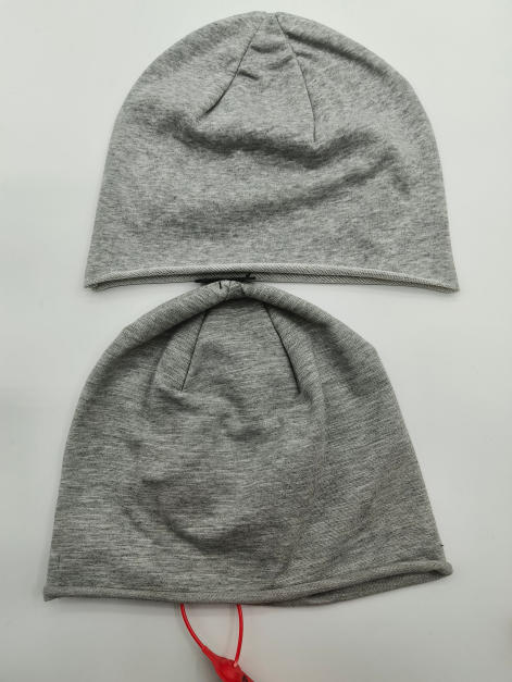 Two grey marl jersey knit slouchy beanie hats laid flat on white background, showing front and back views - custom packaging design free