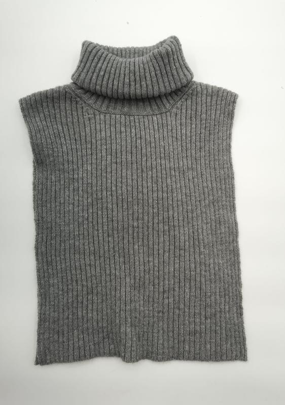 Grey ribbed knit sleeveless turtleneck sweater vest laid flat on white background - low MOQ 50pcs trial order