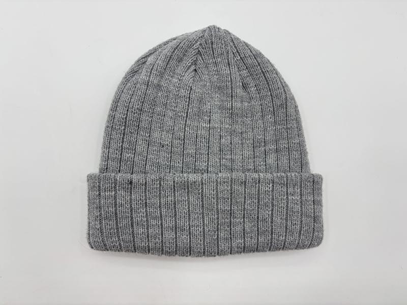 Heather grey ribbed knit cuffed beanie hat laid flat on white background, showing fine rib texture and folded brim - Oeko-Tex Standard 100 certified