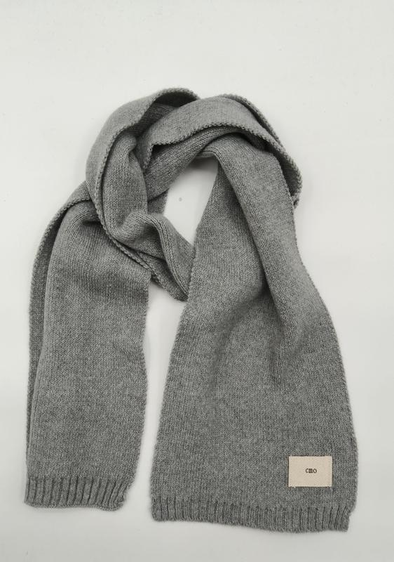 Heather grey knitted scarf with ribbed edges and woven label, loosely draped on white background - MOQ 100pcs mixed colors OK