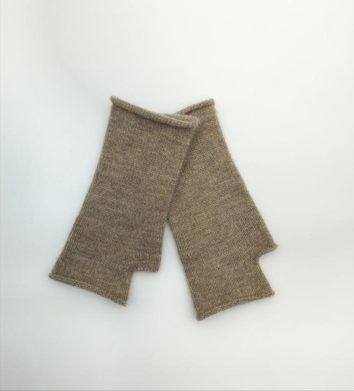 Pair of heathered taupe knitted fingerless gloves laid flat on white background, showing thumbhole detail - gift shop wholesale supplier