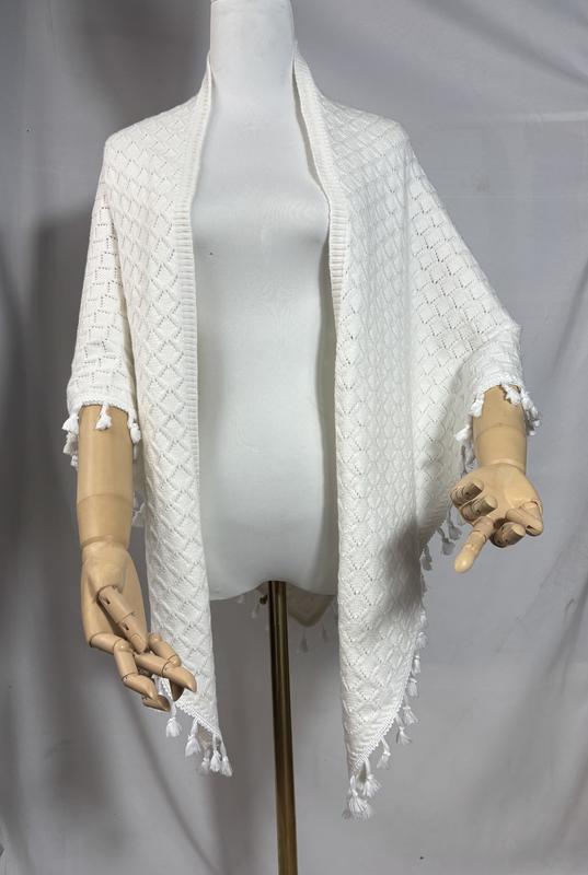 Ivory open-front diamond knit wrap shawl with white tassel fringe trim displayed on a dress form mannequin - gift shop wholesale supplier