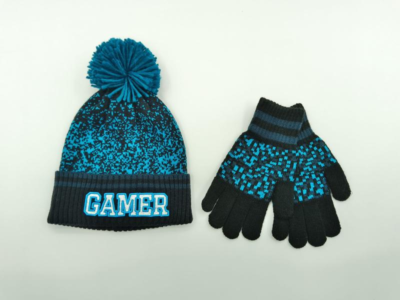 Kids teal and black knit gamer beanie hat with pom-pom and matching pixel-pattern gloves set on white background - wholesale price for Europe buyers