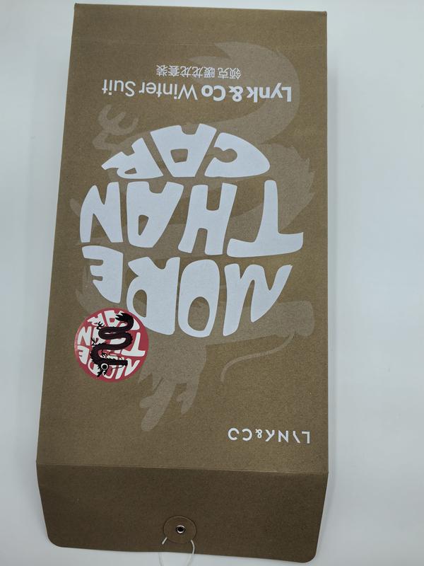 Upside-down kraft brown gift box printed with 'More Than Core' text, dragon sticker, and Lynk & Co Winter Suit branding - certified scarf manufacturer China - sample order 10pcs available