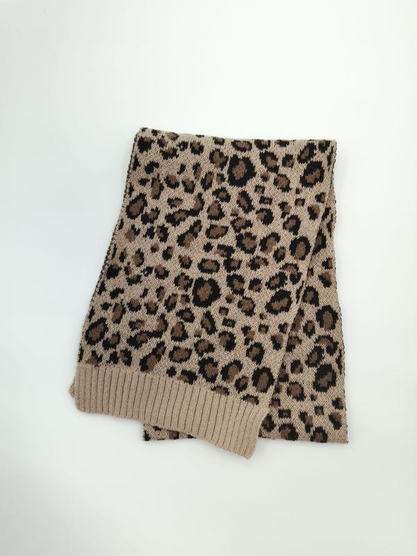 Folded beige and black leopard print knitted scarf with ribbed cuffs on white background - custom size no extra charge