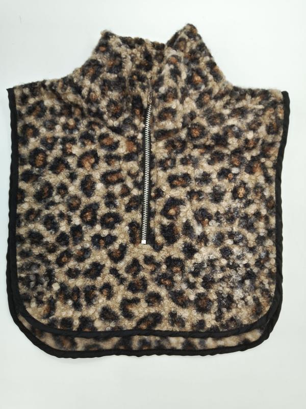 Leopard print sherpa fleece neck warmer dickey with silver half-zip closure and black trim edges, laid flat on white background - custom packaging design free