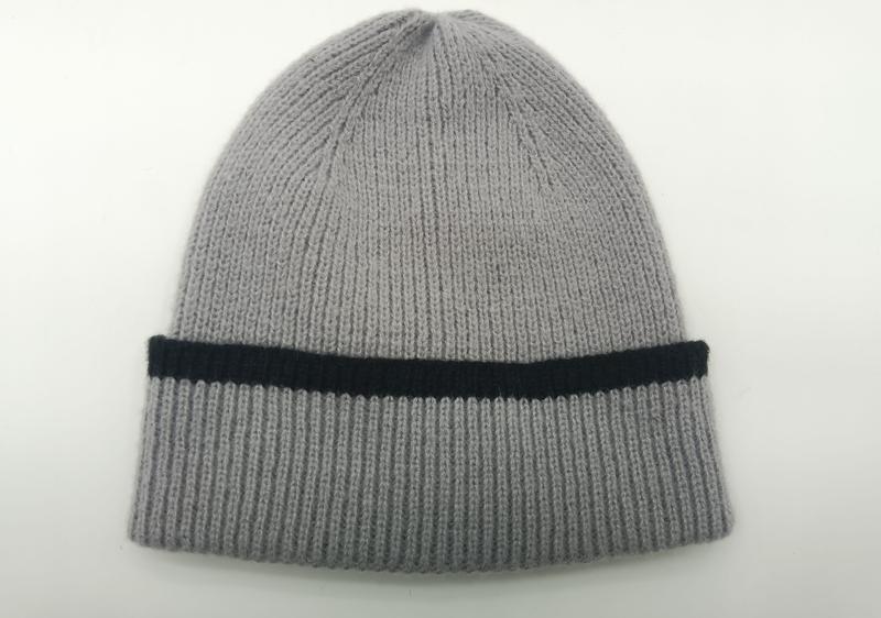 Light grey ribbed knit beanie hat with folded cuff featuring a single black contrast stripe, laid flat on white background - tiered pricing available ask quote
