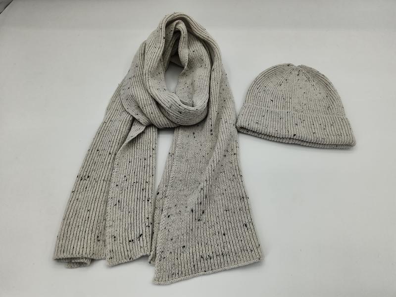 Light grey ribbed knit scarf and matching beanie hat set with dark fleck speckle pattern on white background - factory direct price no middleman