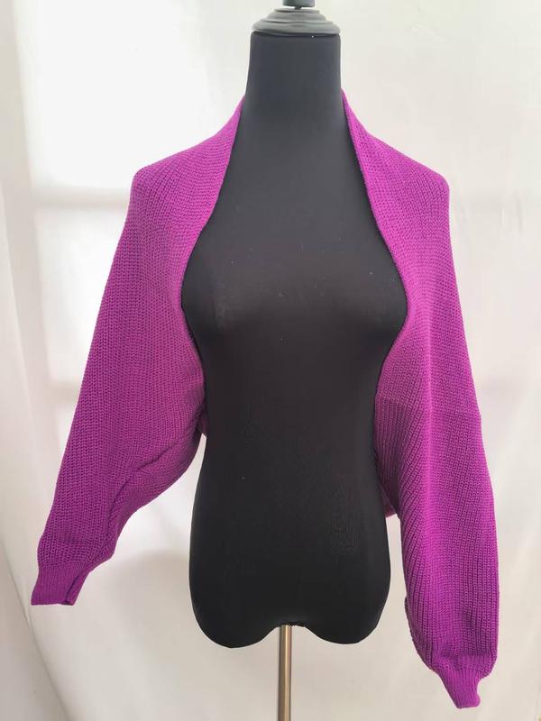 Magenta purple chunky knit open front cropped bolero shrug cardigan with balloon sleeves displayed on black dress form mannequin - hotel amenity scarf supplier