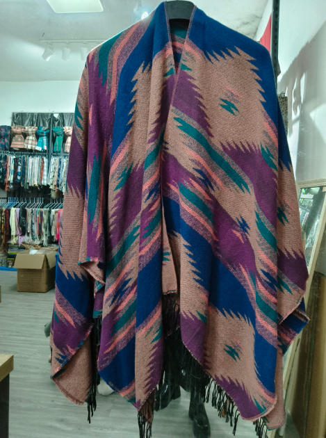 Oversized boho poncho wrap with zigzag Aztec pattern in blue, purple, teal and pink with black fringe hem - express production 15 days