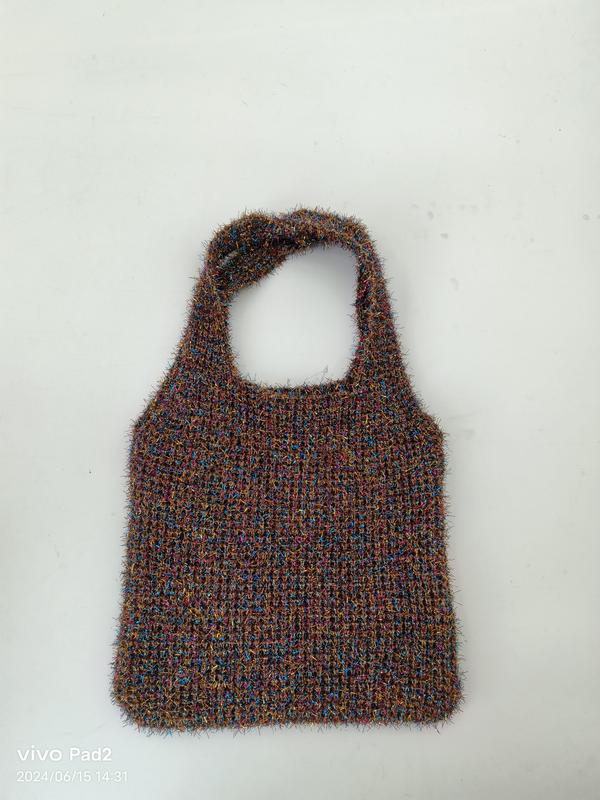 Handknit fuzzy tote bag in multicolor brown blue pink yarn with single loop handle on white background - ISO 9001 quality controlled
