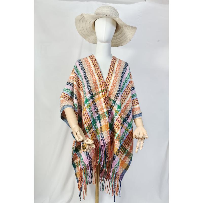 Mannequin wearing multicolor geometric patterned woven fringe poncho cape with wide-brim hat, boho style - small batch 100pcs accepted