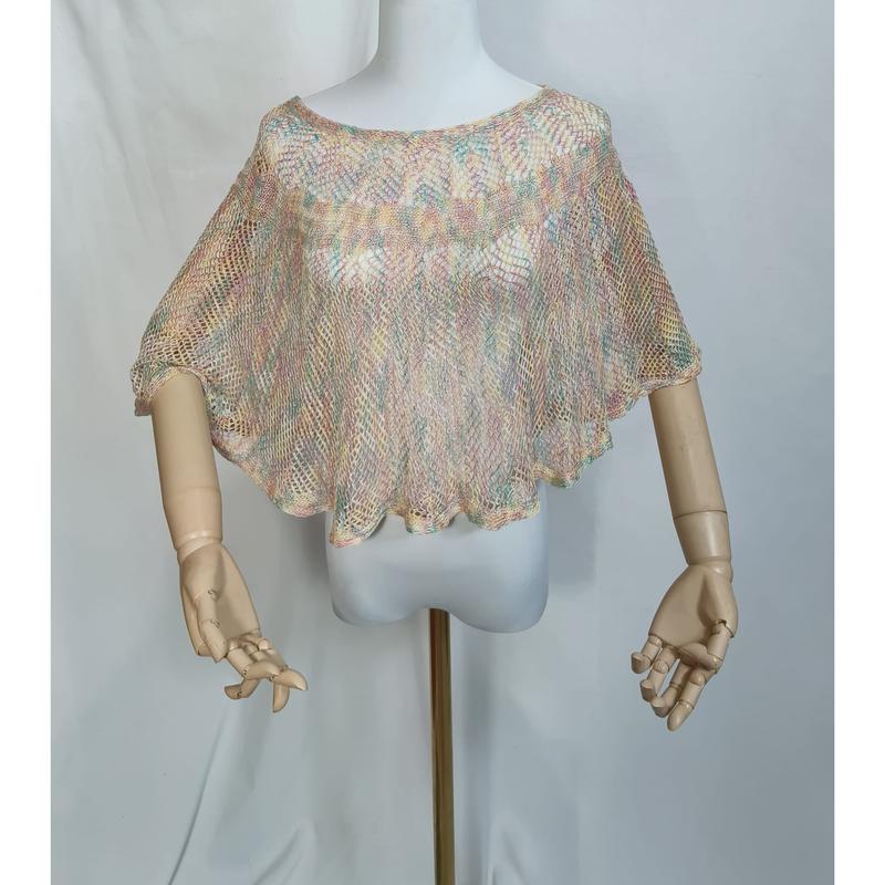 Pastel multicolor open-knit crochet crop poncho top displayed on a mannequin with wooden articulated arms - email us get price list now