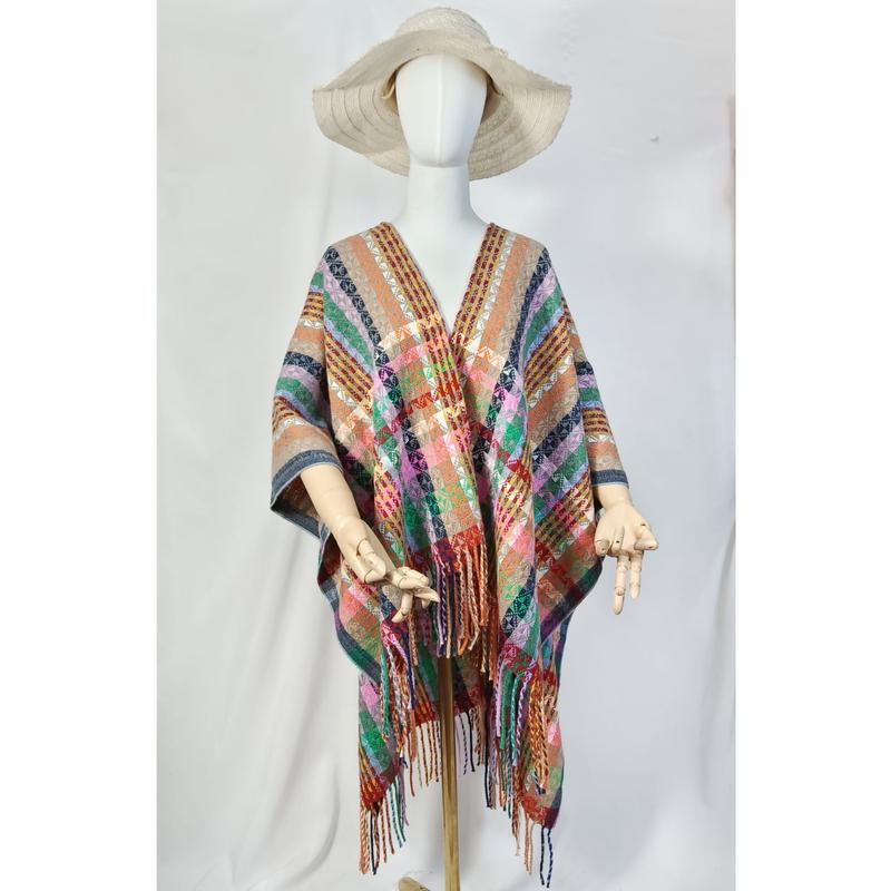 Mannequin wearing multicolor plaid woven poncho with fringe hem and wide-brim straw hat on white background - MOQ 100pcs mixed colors OK