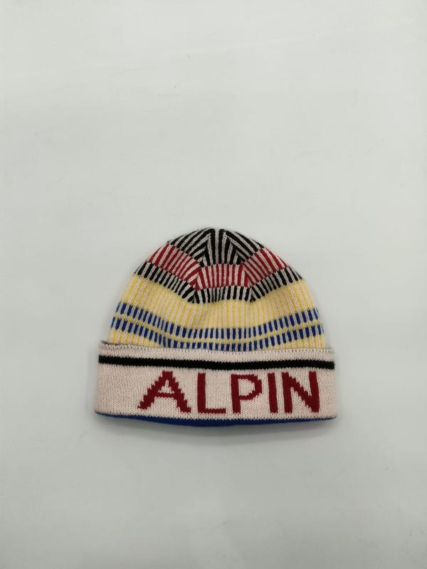 Colorful knit beanie hat with red yellow blue black stripes and ALPIN text on white ribbed cuff, laid flat on white background - MOQ 100pcs mixed colors OK