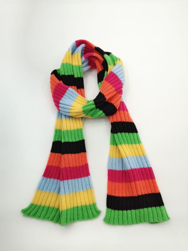 Ribbed knit scarf with bold multicolor stripes in green, yellow, orange, pink, blue, and black, looped on white background - WhatsApp quote in 2 hours