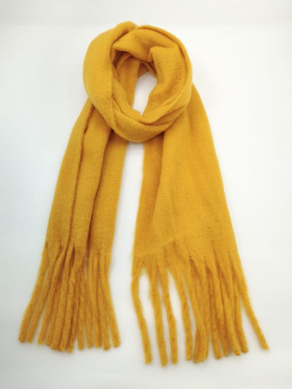 Mustard yellow soft fringed scarf looped and laid flat on white background, showing long tassel ends - contact for custom design quote