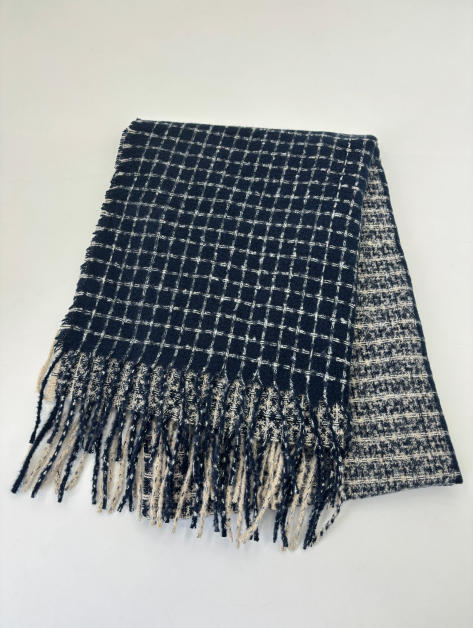 Folded navy blue and cream woven check scarf with long fringe trim, flat lay on white background - wholesale price for USA buyers