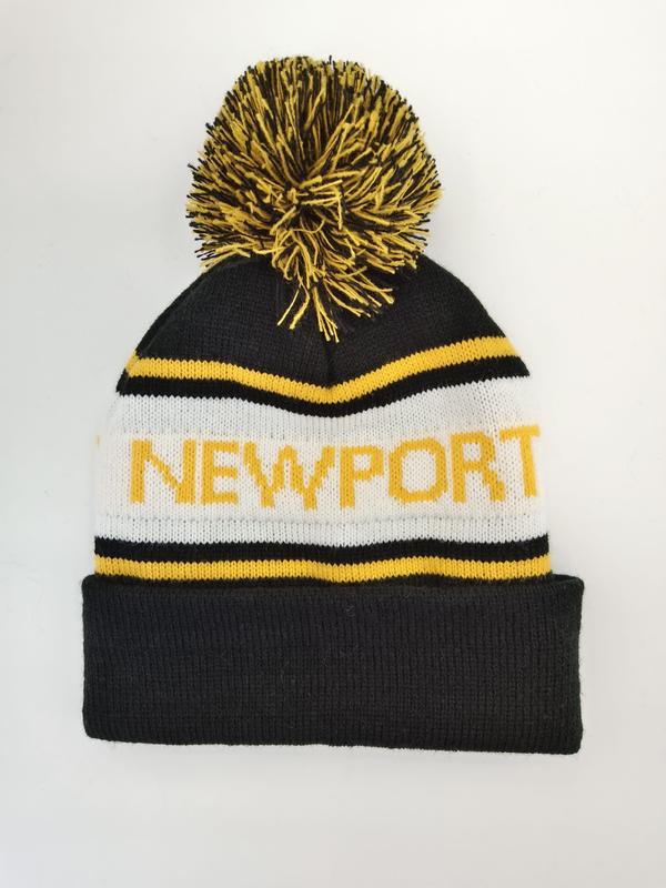 Black white and yellow striped knit beanie hat with Newport text and large black yellow pom-pom on white background - 5-day digital sample ready