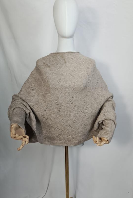 Back view of oversized oatmeal beige pointelle knit sweater with balloon sleeves on white mannequin with wooden hands - custom size no extra charge