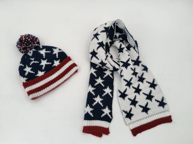 Knit patriotic beanie hat with pom-pom and matching scarf featuring star pattern in navy, red, and white - event merchandise supplier