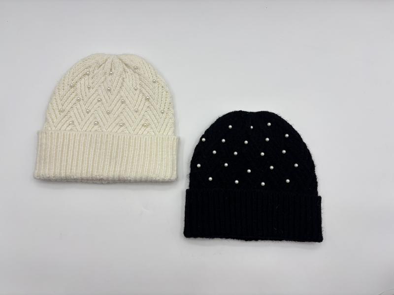 Two knit beanies with pearl embellishments side by side, cream chevron pattern and solid black, ribbed cuff winter hats - ask bulk pricing get discount