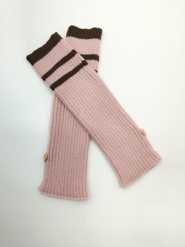 Pair of pink ribbed knit fingerless arm warmers with brown striped cuffs and small wooden buttons on white background - BSCI + Oeko-Tex + GRS certified