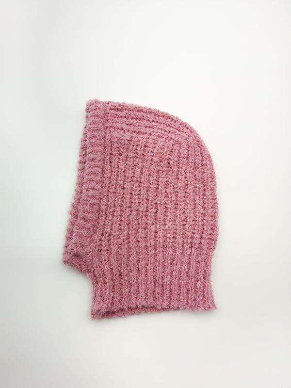 Pink chunky ribbed knit balaclava ski mask hood laid flat on white background showing textured waffle knit pattern - Oeko-Tex Standard 100 certified