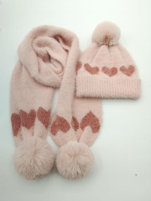 Pink fluffy knit winter beanie hat and scarf set featuring rose heart pattern and faux fur pom pom accents on white background - bulk order 20-day delivery