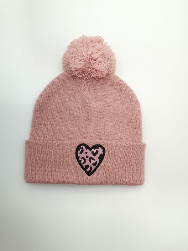 Dusty pink knit winter beanie hat with fluffy pom-pom on top and black-outlined leopard print heart patch on cuff - no MOQ for stock designs