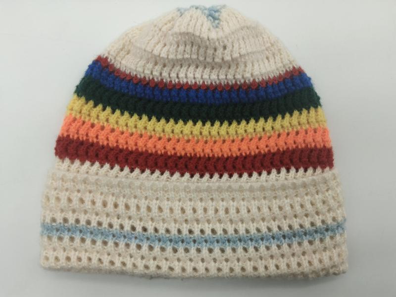 Handknit cream beanie hat with rainbow stripes in red, orange, yellow, green and blue on open mesh knit base - air shipping 5-7 days arrival