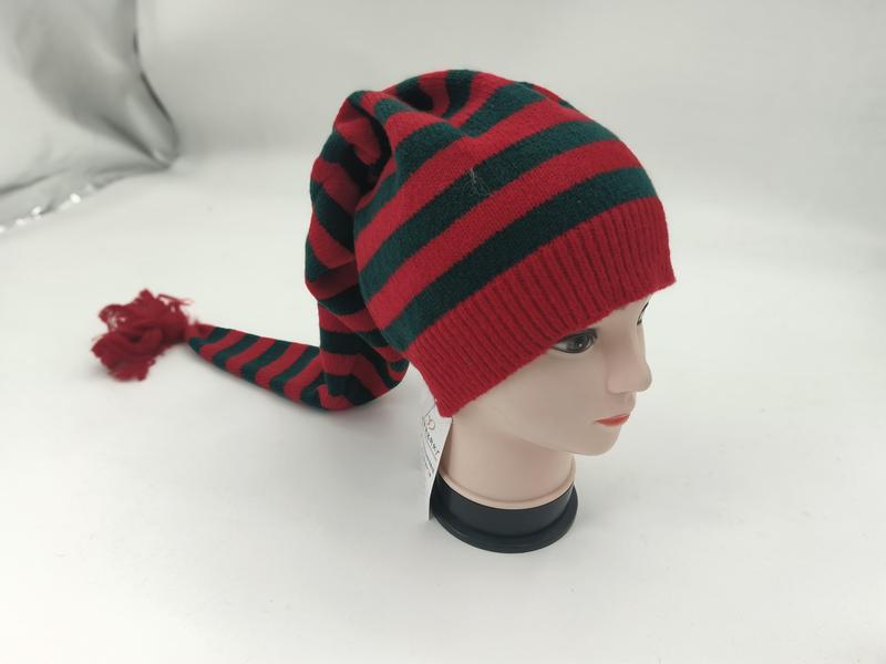 Red and green striped knit Christmas elf hat with long tail and tassel displayed on mannequin head - WhatsApp quote in 2 hours