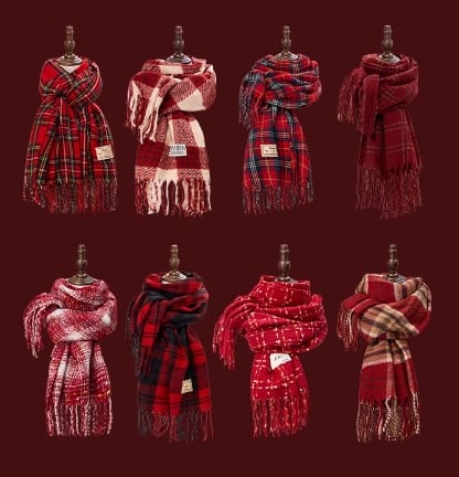 Eight red tartan plaid winter scarves with fringe displayed on mannequins against a dark red background, showing various plaid patterns - wholesale price for Europe buyers