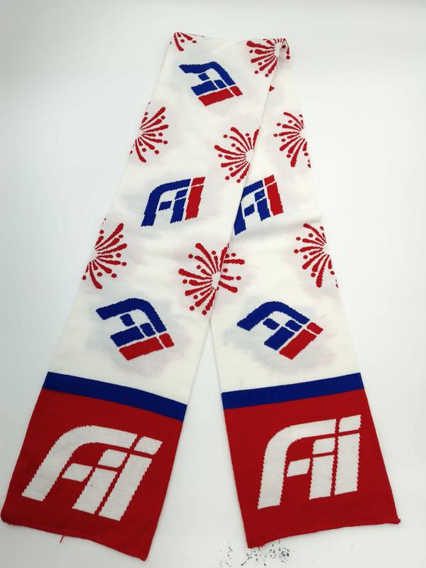 Knitted scarf in red, white and blue with repeated logo and firework motifs, red ends with large white emblem - jacquard custom pattern accepted