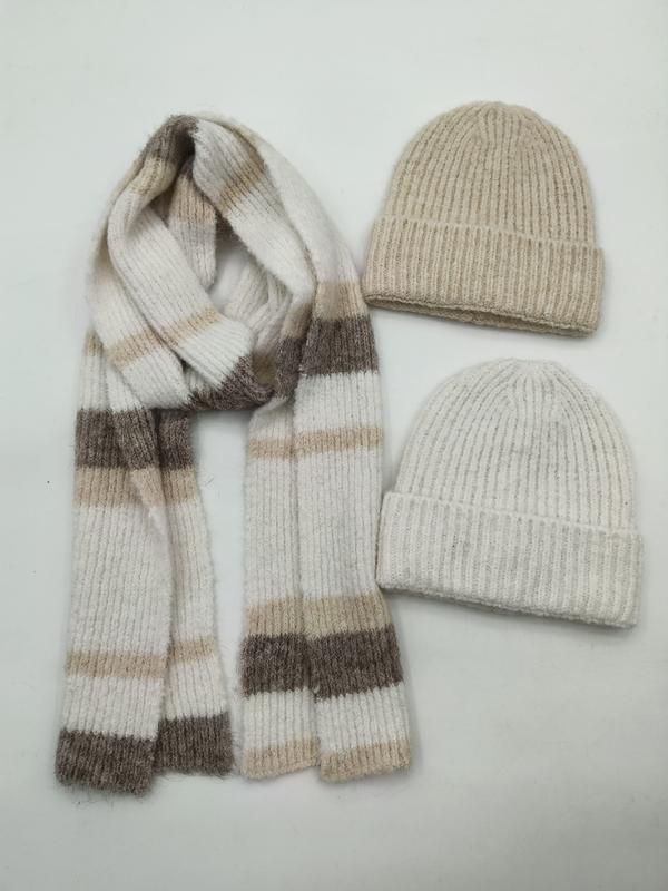 Two ribbed knit beanie hats in beige and cream with a matching striped knit scarf in neutral tones on white background - event merchandise supplier