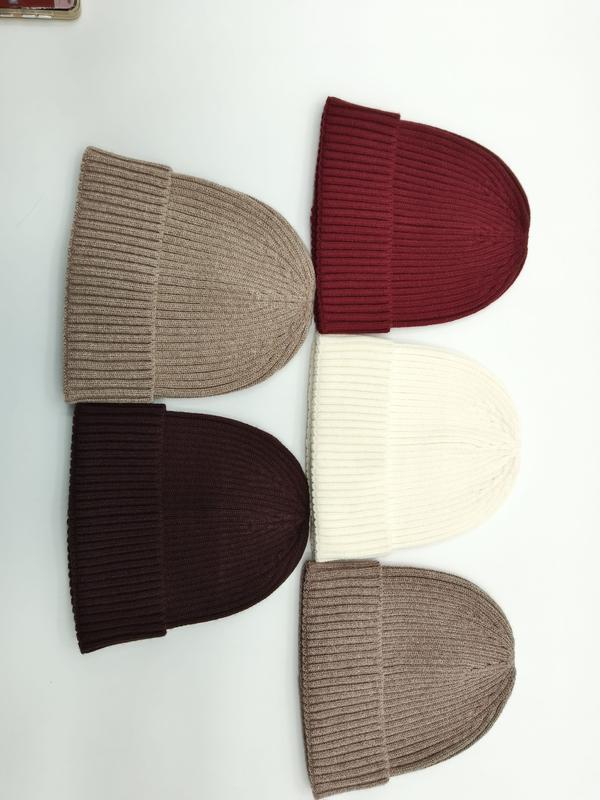 Five ribbed knit beanies laid flat in beige, burgundy, cream, dark brown, and taupe on white background - ODM OEM service available - wholesale price for Europe buyers
