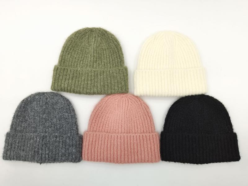 Five ribbed knit beanies in olive green, cream, gray, blush pink, and black arranged on white background - custom size no extra charge