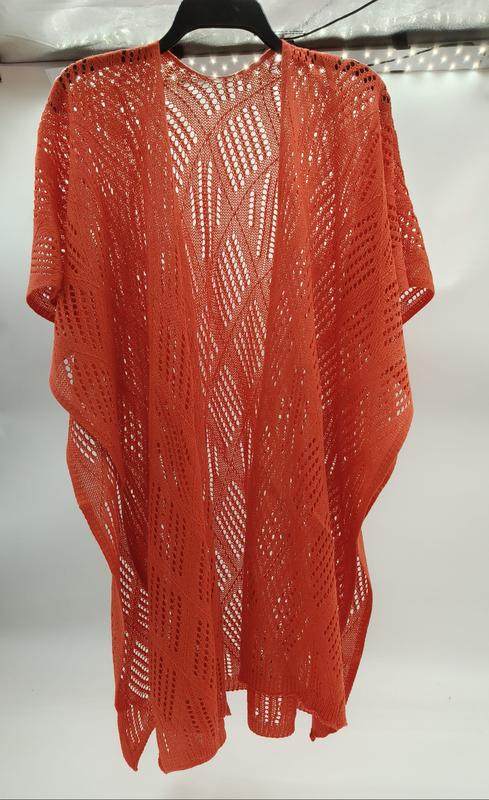 Rust orange open-knit crochet kimono cardigan with geometric lace pattern and short sleeves displayed on hanger - Oeko-Tex Standard 100 certified
