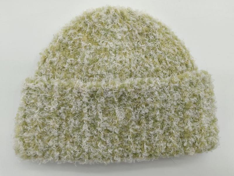 Sage green and cream boucle knit beanie hat with folded cuff, curly textured yarn, on white background - BSCI audit passed supplier