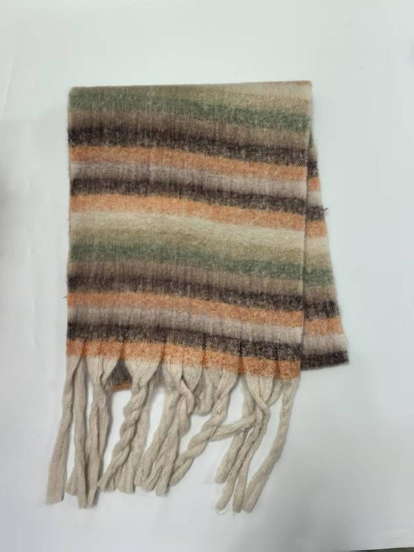 Folded striped scarf in earthy orange, green, beige, and brown tones with twisted cream fringe tassels on white background - no MOQ for stock designs