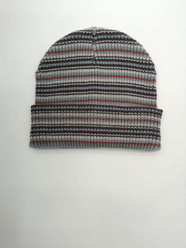 Flat lay of a ribbed knit beanie in multicolor stripes including grey, blue, brown, red, and green with a folded cuff - corporate gift customization
