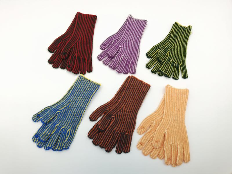 Six pairs of ribbed knit striped gloves in red, purple, green, blue, brown, and peach laid flat on white background - BSCI + Oeko-Tex + GRS certified