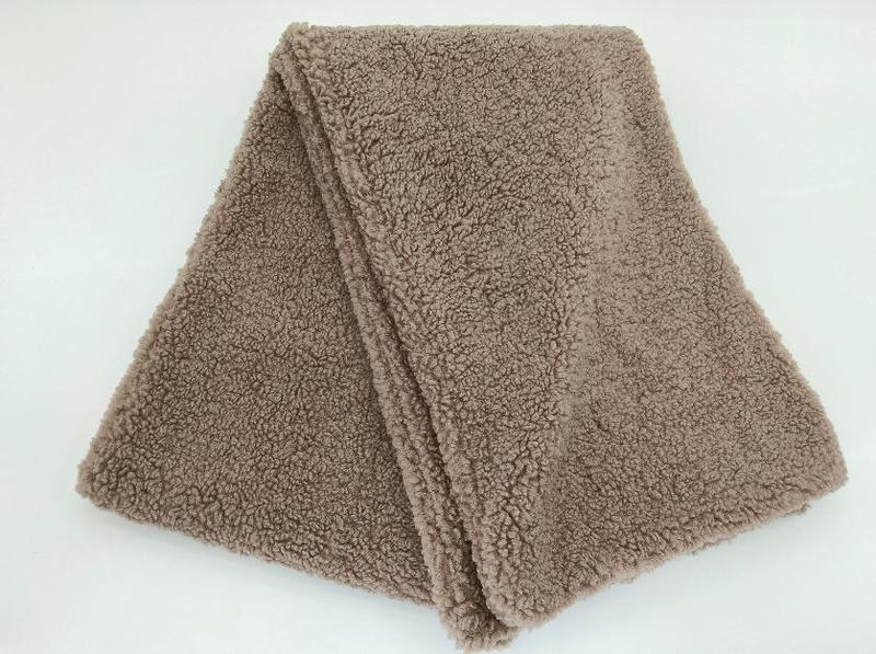 Folded taupe sherpa fleece throw blanket with curly textured pile and finished edges on white background - sample order 10pcs available