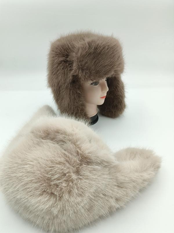 Taupe faux fur ushanka trapper hat displayed on mannequin head with matching fluffy faux fur scarf in foreground - air shipping 5-7 days arrival