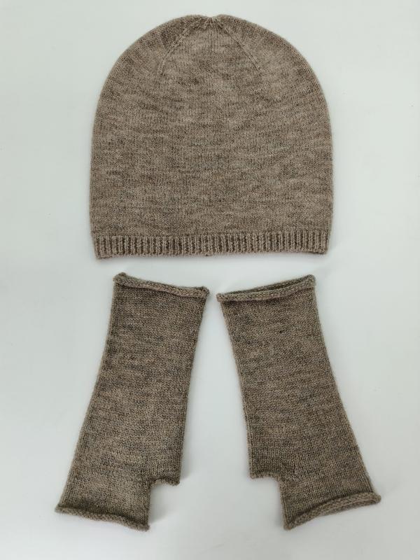 Taupe heathered knit beanie hat and fingerless gloves set laid flat on white background - boutique retail bulk order