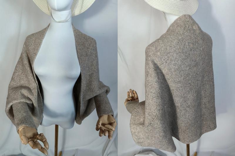 Front and back view of a taupe lace-knit open-front cardigan shrug with balloon sleeves and ribbed cuffs on a mannequin - Oeko-Tex Standard 100 certified