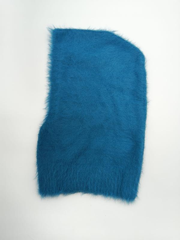 Teal blue fluffy angora-style knit balaclava hood laid flat on white background showing soft texture - custom Pantone color matching